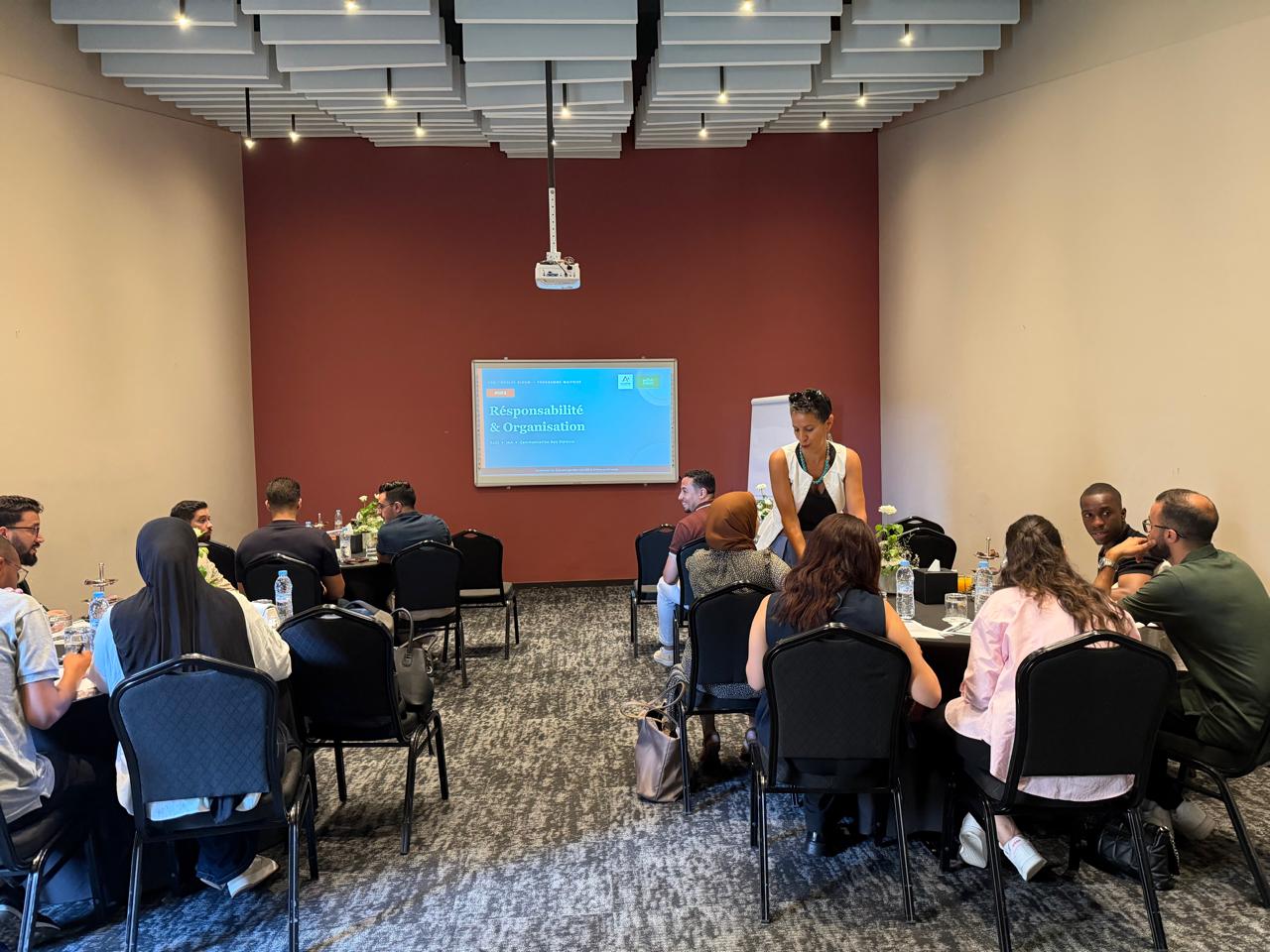 Merieme Lakhdar facilitating a corporate training session